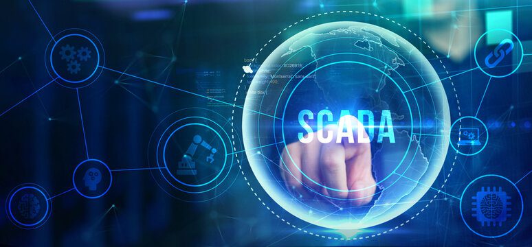 Engineers developing Building SCADA Applications on workstation.